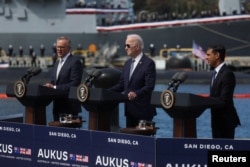 ABD Başkanı Joe Biden, Avustralya Başbakanı Anthony Albanese ve İngiltere Başbakanı Rishi Sunak, 13 Mart 2023.